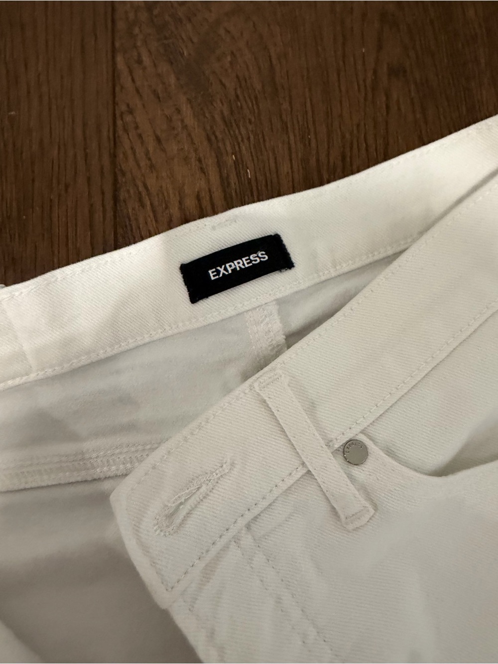 Express white womenβs jeans 4L
